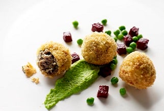 Lamb scrumpets with pea puree and beets