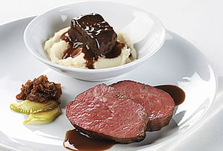 Medallion of Aussie striploin and braised beef shortribs on cauliflower puree and apple and spanish onion jam
