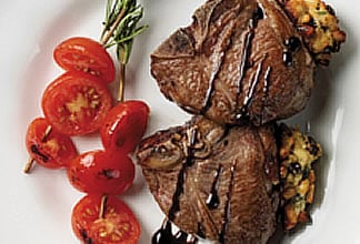 Lamb T-bone Chops with Mediterranean Stuffing and Rosemary Spiked Tomatoes