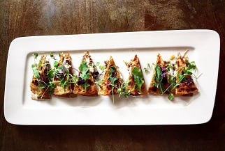 Spicy Lamb and Feta Flatbread with Grilled Lemon and Arugula